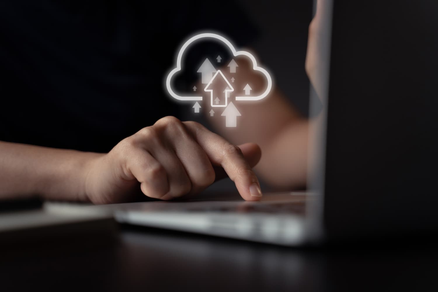 Close-up of hand interacting with digital cloud icon on device, representing our zero-cost data ingress transfer solutions. Close-up of hand interacting with digital cloud icon on device, representing our zero-cost data ingress transfer solutions.